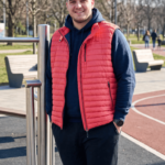 sporty_model_wearing_red_vest