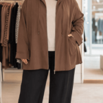 plus_size_model_wearing_brown_jacket